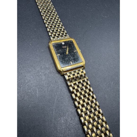 Vintage Seiko 7N00-5B49 Men\'s Classic Gold Tone Watch Black Dial Rectangle main image 9